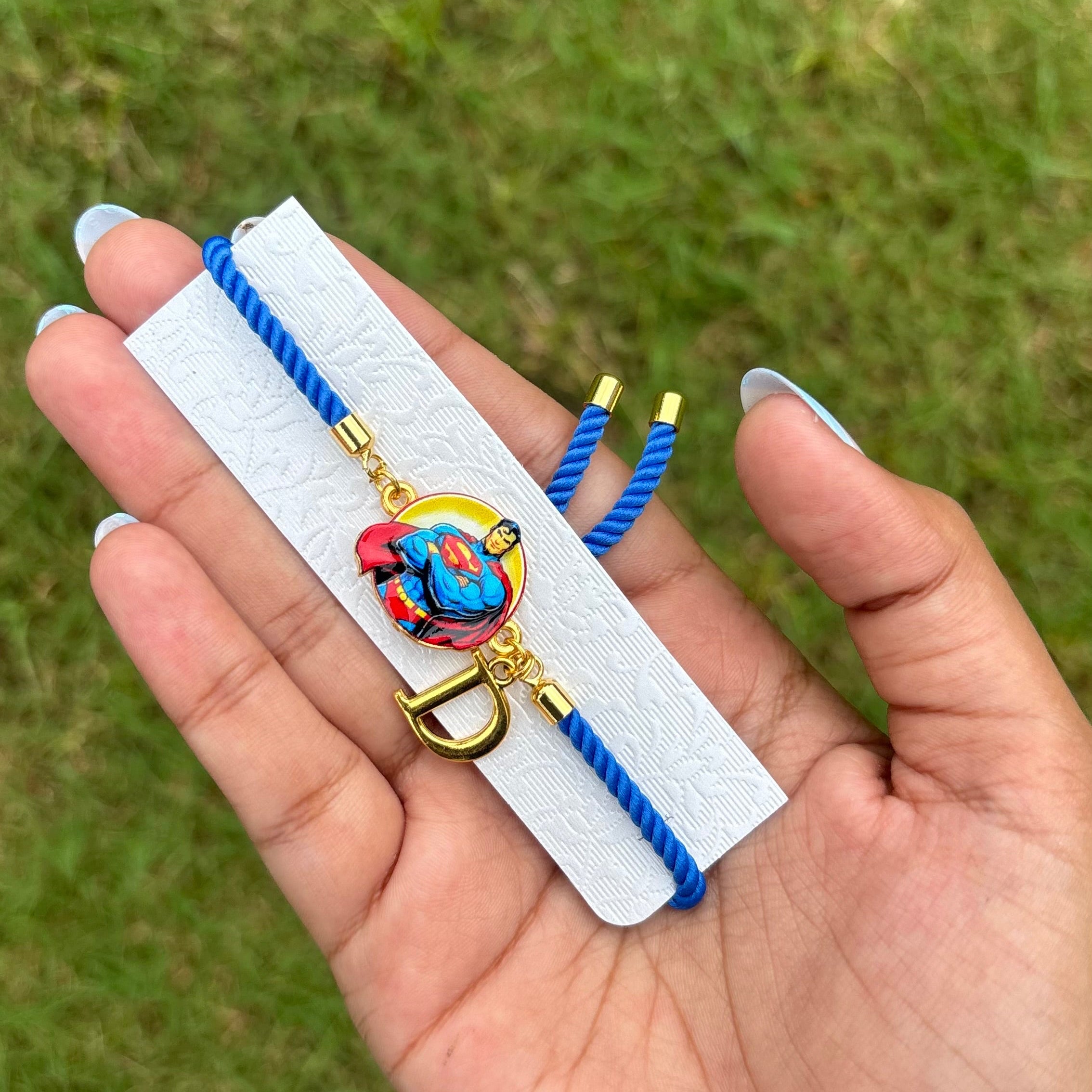 Superman bracelet rakhi with initial